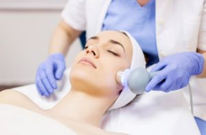 woman_receiving_skin_resurfacing_treatment_657671370-e1696966869724-300x197